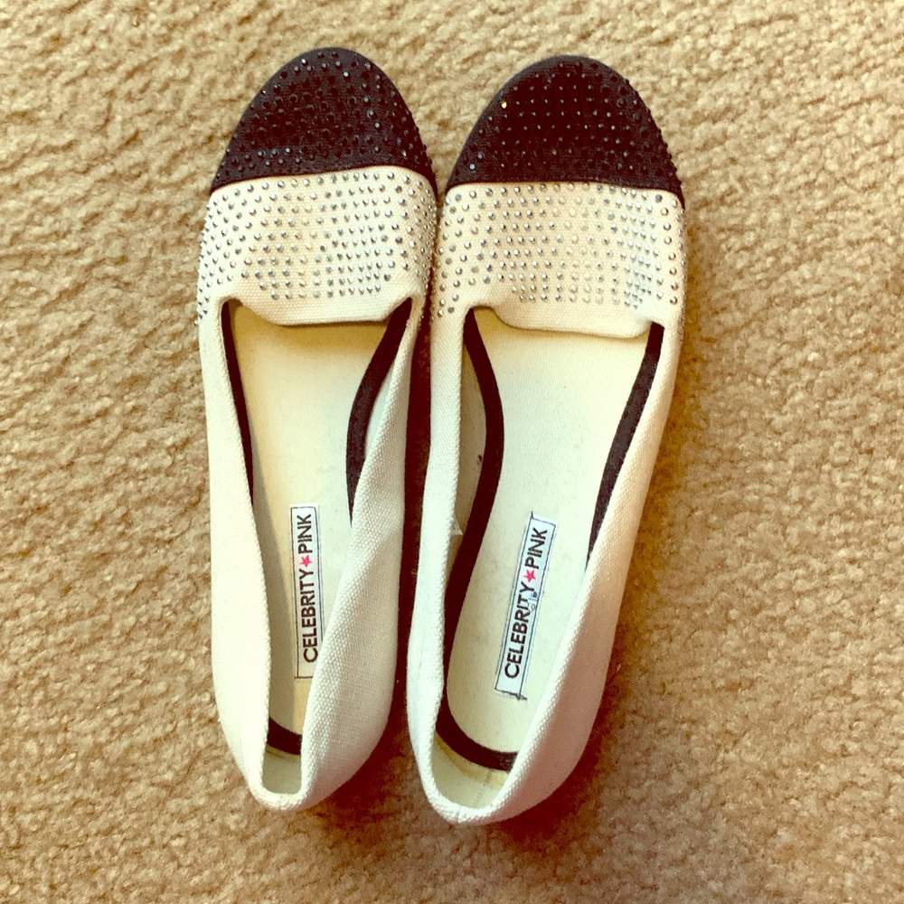 Tan and black flats